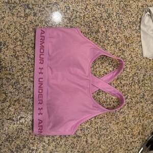 Under Armour Women's Pink Mid Impact Crossback Sports Bra